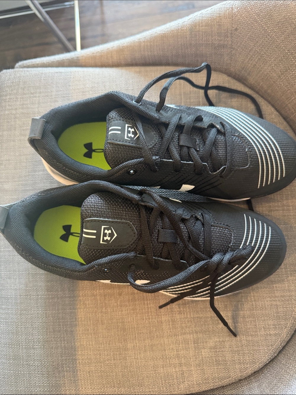 Under Armour womenโs Black Athletic Sneakers with Lime Green Insoles